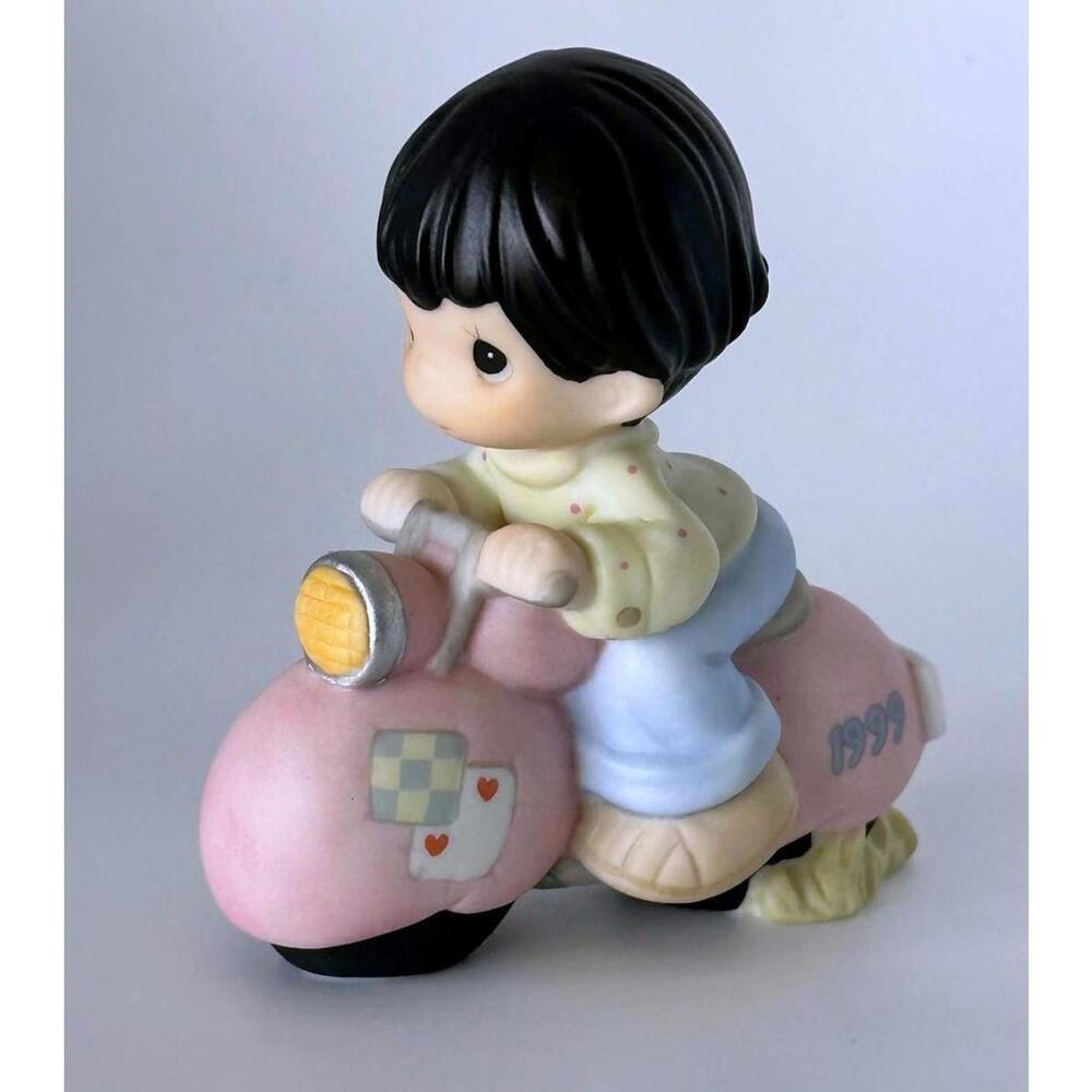 Precious Moments Boy on Pink Scooter Figurine In Soft Pastels